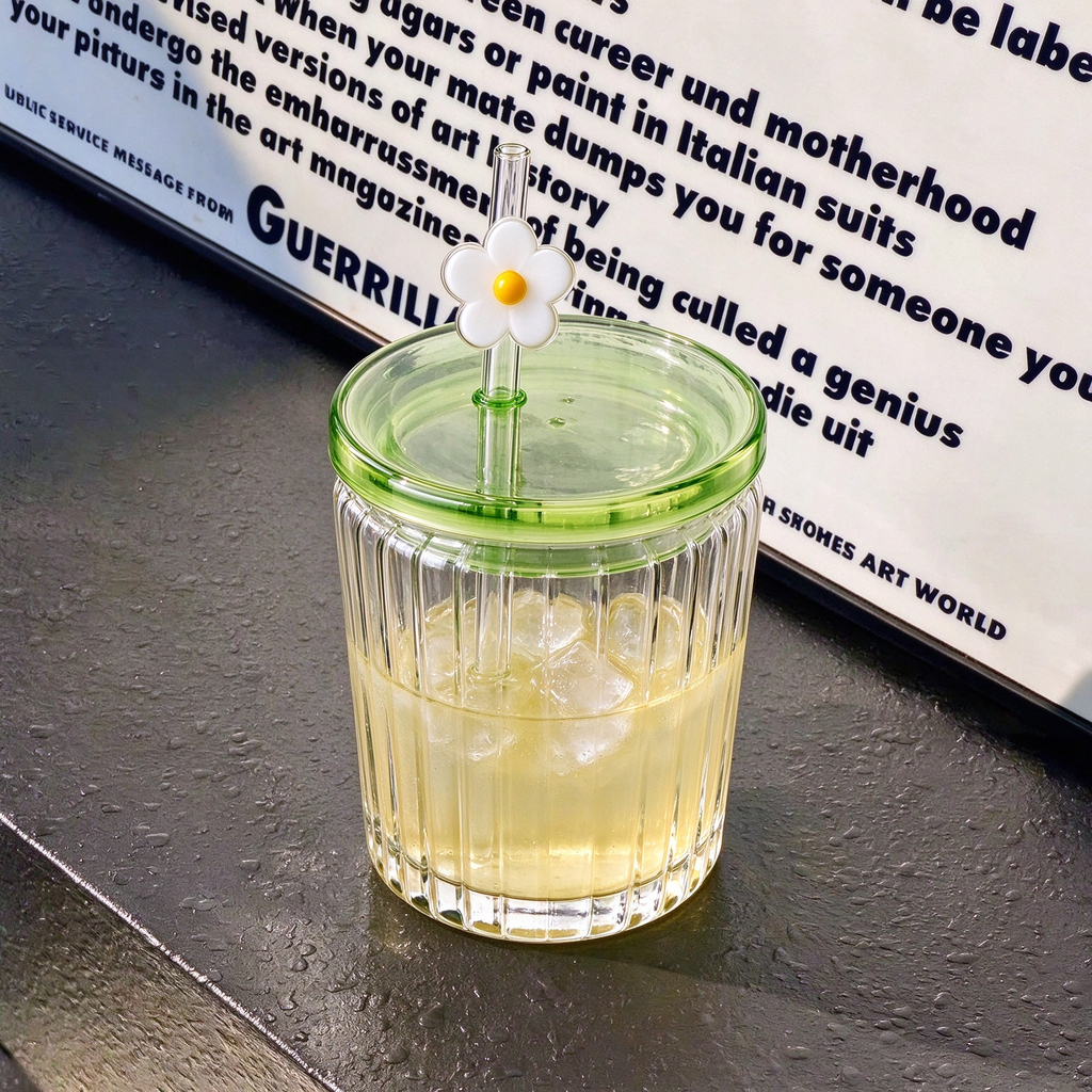 Vertical Ribbed Glass Tumbler With Green Lid And Daisy Straw Topper
